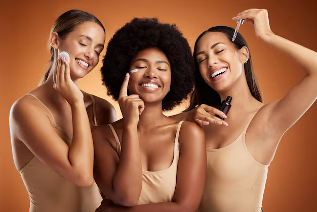 women applying skincare products