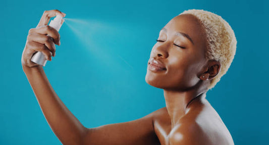 woman applying setting spray